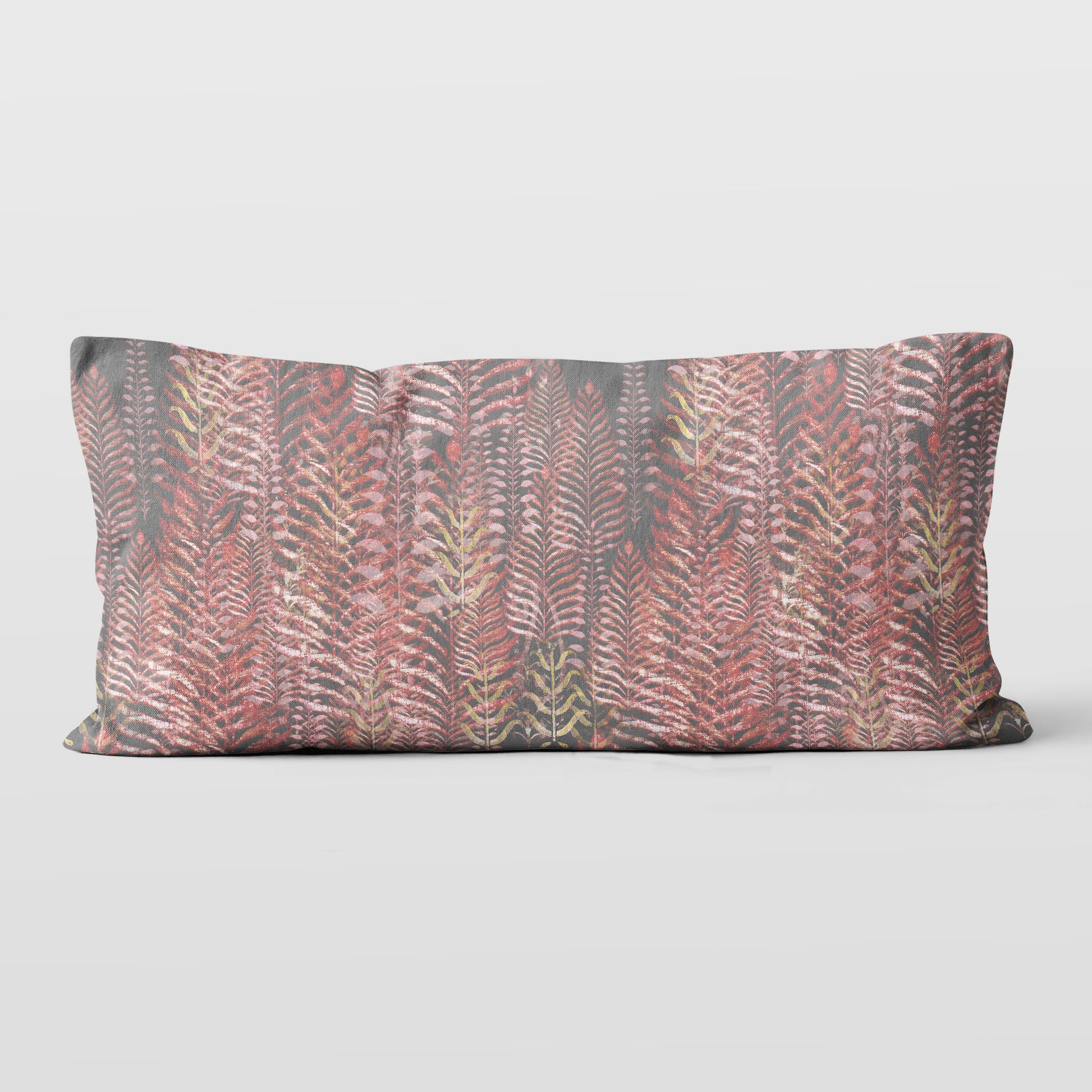 12 x 24 inch lumbar pillow featuring feather block print in pink and gray tones.