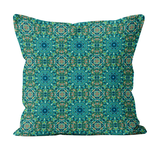Pillow featuring an abstract teal watercolor pattern