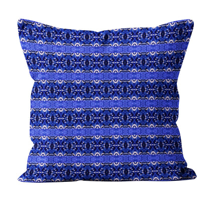 Cobalt blue striped pillow on a white background