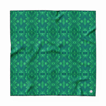 Hand painted pattern on silk scarf in emerald green