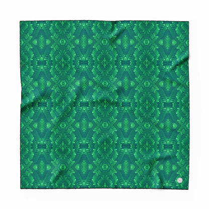 Hand painted pattern on silk scarf in emerald green
