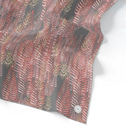 Silk scarf featuring a pink and gray woodblock pattern.