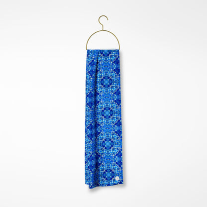 Lisbon oblong silk scarf featuring a cobalt blue, abstract hand-painted pattern.