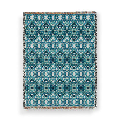 Cotton woven throw blanket featuring a teal hand-painted pattern