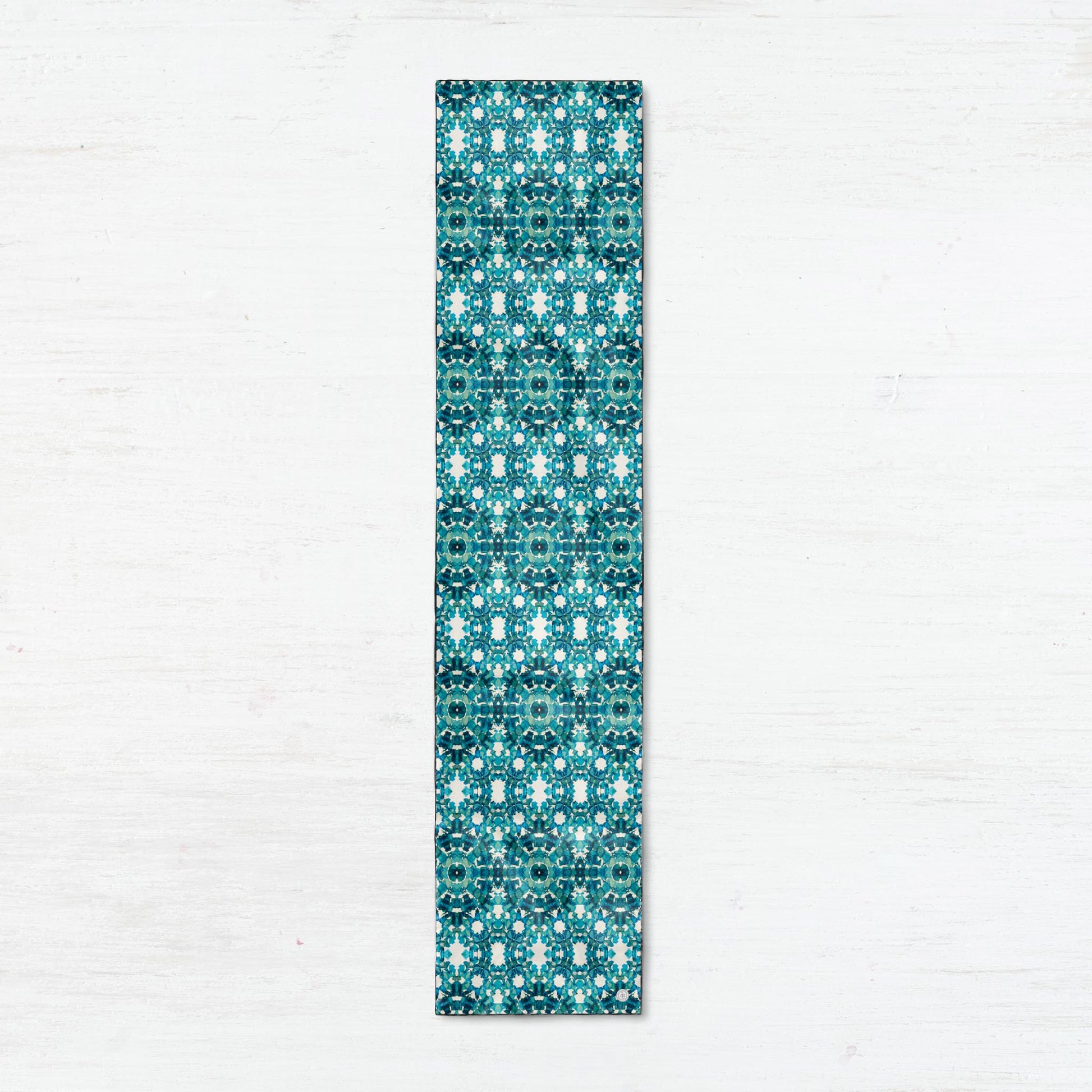 Rectangular silk scarf, featuring an abstract teal pattern